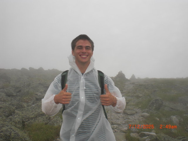 Image of Max Resnik on a hike this summer